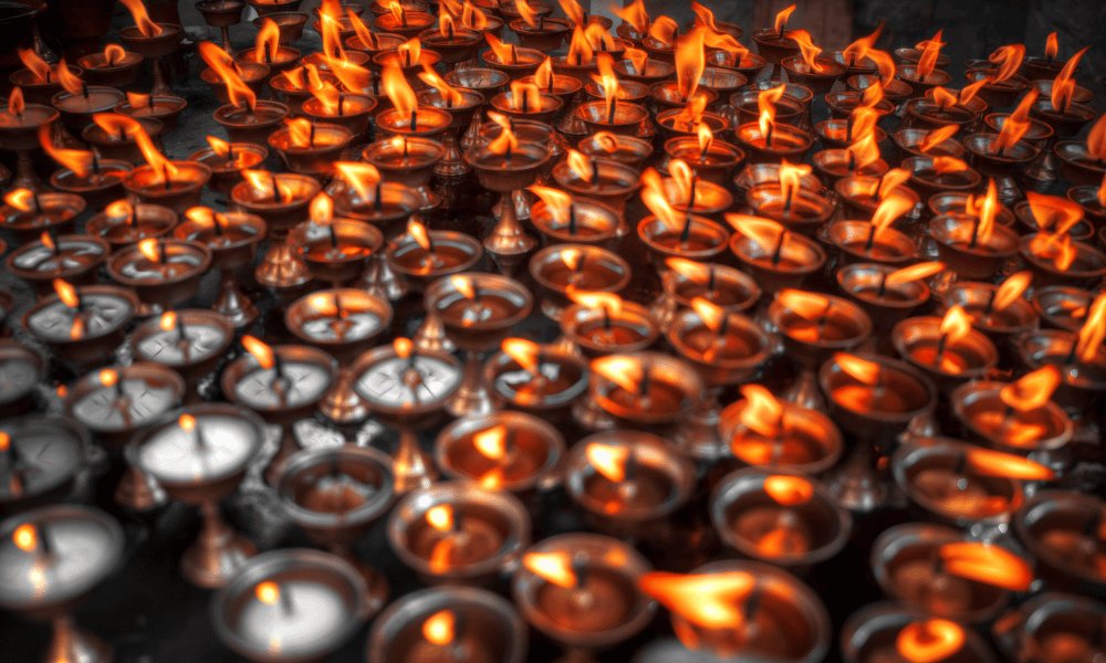 multiple lit diya