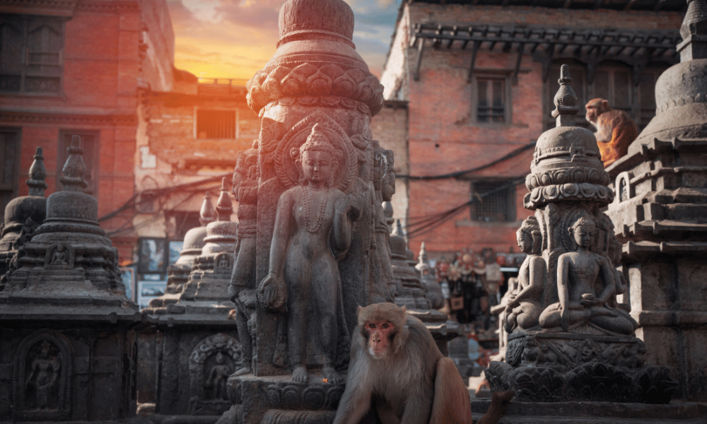 golden sky, statue of Buddha and chaitya in Swayambhu